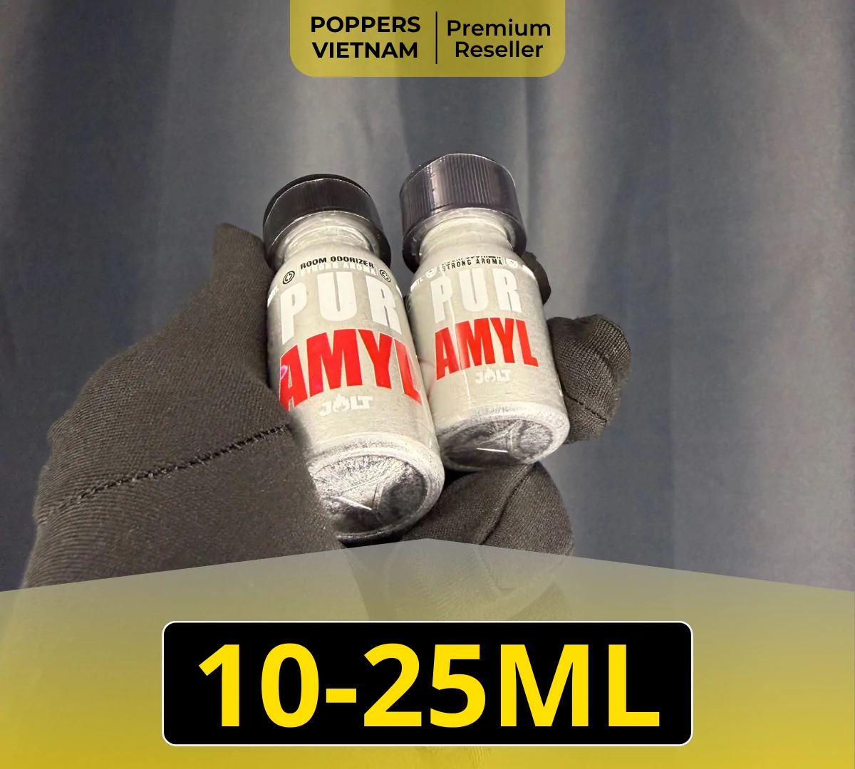 Hình ảnh là 2 chai popper Jolt Amyl 10ml và 25ml. Sản phẩm được chụ cẩn cảnh trên găng tay đen sạch sẽ.