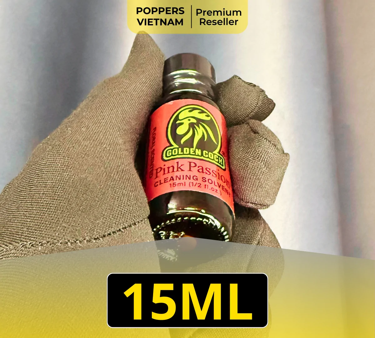 Ảnh chụp chai popper thứ hai trong nhóm thơm nhất: Golden Cock Pink Passion 15ml. Sản phẩm có màu hồng là chủ đạo, kết hợp với logo hình "con Gà" màu vàng.